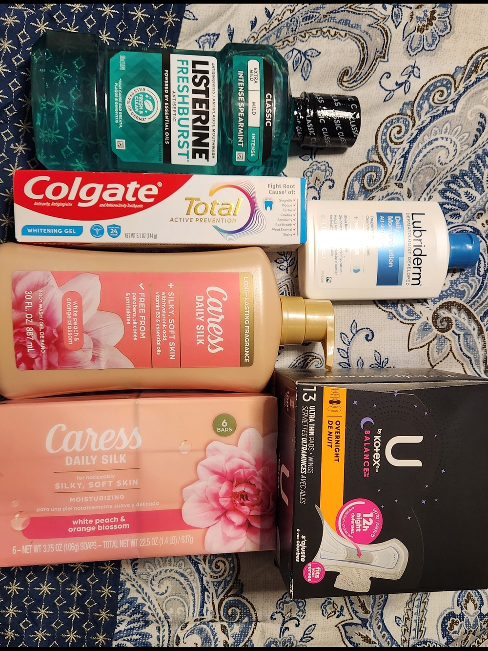 Selfcare Bundle Colgate, Kotex, Lubriderm & Listerine  Caress Daily Silk
